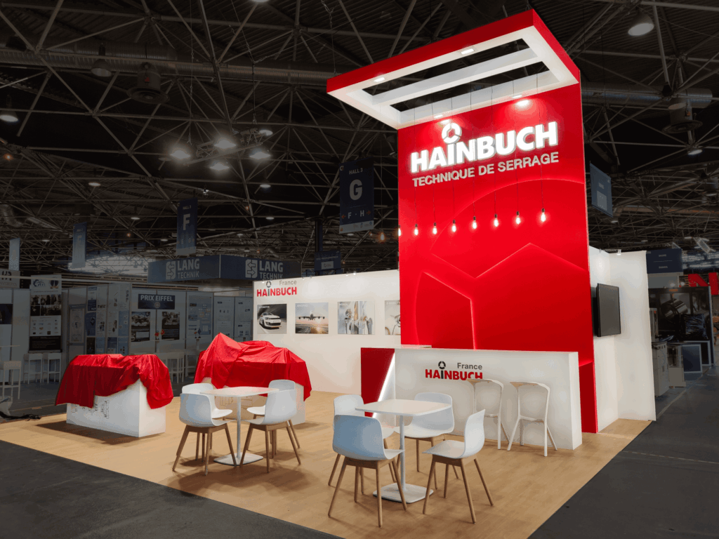 Stand modulaire sur mesure conçu par AB Prestige Communication pour Hainbuch France lors d’un salon professionnel à Paris.